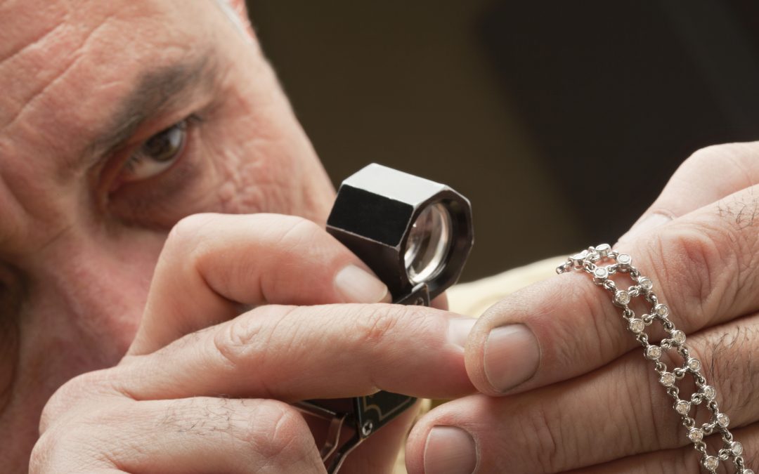 jeweler with loupe